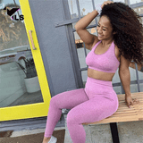 legging fitness push rose modele sur un banc 600x600px